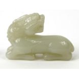 Oriental Chinese jade carving of a lion, 9cm wide : For Condition Reports please visit www.