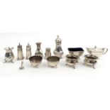 Silver items comprising three piece cruet, two pairs of salts, pair of sifters, two other sifters
