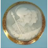 Classical cameo brooch with male and female busts in an unmarked gold mount, 4.5cm diameter,