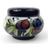 Moorcroft Wisteria patterned pottery jar and cover, impressed mark to base, 11cm high : For