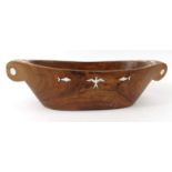 Solomon Islands carved wooden bowl with mother of pearl bird and fish design inlay, 48cm long pearl,