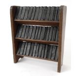 Miniature set of William Shakespeare books housed in an oak bookcase, Allied Newspapers Ltd, 200