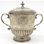 William Comyns silver trophy and cover, London 1910-11, 20.5cm high : For Condition Reports please