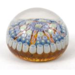 Glass paperweight with colourful glass canes and star cut base, approximately 6.5cm diameter : For