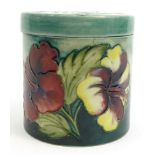 Moorcroft Hibiscus patterned pottery pot and cover, Potters to the Late Queen Mary label to base,