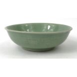 Oriental Chinese celadon bowl, incised with dragons to the exterior, 20cm diameter : For Condition