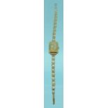 Baume 9ct gold lady's wristwatch with 9ct gold strap : For Condition Reports please visit www.