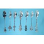 Seven assorted silver spoons including enamelled example, some Continental, the largest 15cm