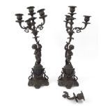 Pair of Victorian bronze cherub candelabra with putti supports, 45cm high : For Condition Reports