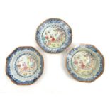 Three oriental Chinese blue and white shallow dishes hand enamelled with figures and flowers, each