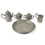 Oriental Chinese Kut Hing Swatow pewter tea service on tray, decorated with flowers, the tray 31cm
