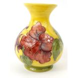 Moorcroft Hibiscus patterned pottery vase, impressed mark to base, 13cm high : For Condition Reports