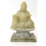 Oriental Chinese carved soapstone model of a seated Buddha on lotus flower, 17cm high : For