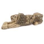 Afghan tribal carved stone lion, 65cm long : For Condition Reports please visit www.