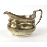 Georgian silver sauce boat, TB London 1818-19, 15cm long : For Condition Reports please visit www.