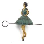 Tinplate toy ballerina spinning top, 14cm high : For Condition Reports please visit www.