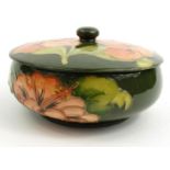 Moorcroft Hibiscus patterned pottery powder bowl and cover, Potters to the Late Queen Mary label