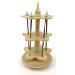 Early Victorian ivory and brass three tier cottonreel stand, 17cm high : For Condition Reports