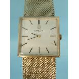 Lady's 9ct gold Omega wristwatch with 9ct gold strap, approximate weight 50.5g : For Condition