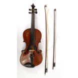 Old wooden violin with two bows, paper label for Andreas Amati Gall Cremon No. 1642 to the interior,