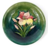 Moorcroft Spring Flowers patterned pottery plate, signature mark to back, 22cm diameter : For