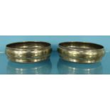 Pair of circular silver wine coasters, hallmarked Birmingham 1909-10, 13.5cm diameter : For