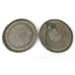 Pair Middle Eastern silvered copper trays, one decorated with flowers the other decorated with
