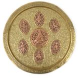 Ornate Indian brass and copper tray decorated in relief with panels of gods, 41cm diameter : For