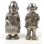 Pair of novelty silver coloured metal figural sifters, 8.5cm high : For Condition Reports please