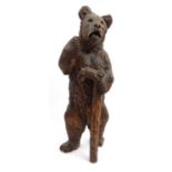 Large wooden carved Black Forest model of a bear with a walking stick, 56cm high : For Condition