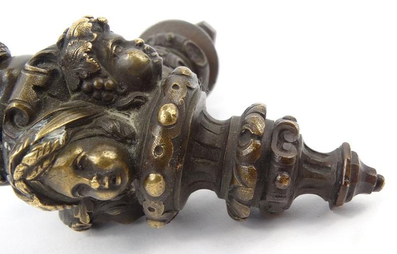 Victorian bronze handle depicting a garlanded cherub, 12cm high : For Condition Reports please visit - Image 6 of 8