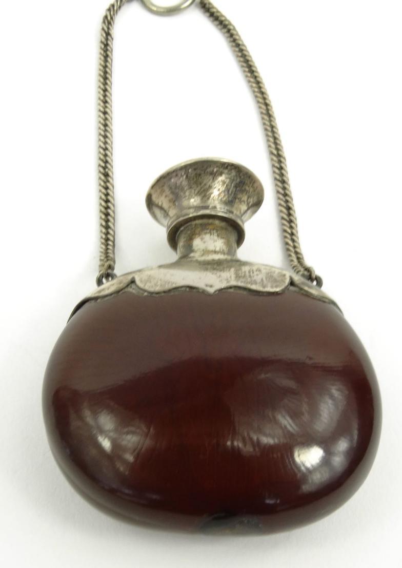 Unusual silver topped nut scent bottle on chain, 6cm long : For Condition Reports please visit www. - Image 2 of 5