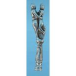 Novelty silver pipe tamper in the form of an embracing couple, hallmarked London 1977, 7cm long :