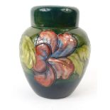 Moorcroft Hibiscus patterned pottery ginger jar and cover, impressed mark and paper label to base,