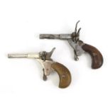 Two Victorian pocket pistols - one stamped 'Germany', 11cm long : For Condition Reports please visit