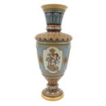 Metlach stoneware vase with cherub decoration, impressed marks to the base, 36cm high : For