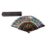 Oriental Chinese fan hand painted with court scenes, housed in a black lacquer box, 29cm long :
