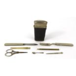 Victorian cased etui including scissors, folding fork, penknife, miniature spoons, etc, 10cm