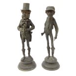 Pair of Victorian novelty spelter candlesticks in the form of a jockey and gentleman, the jockey