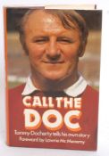 FOOTBALL; Call The Doc. Tommy Docherty - signed edition book.
