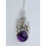 A silver and amethyst ball necklace poss