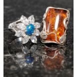 A silver and amber style ring together w