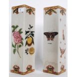 A pair of French hand painted Art Nouveau style vases depicting birds, butterflies and fauna.