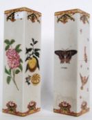 A pair of French hand painted Art Nouveau style vases depicting birds, butterflies and fauna.