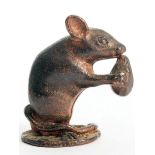 A miniature bronze metal mouse with WRL