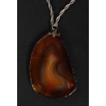 A silver and agate stone pendant necklac