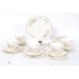 A chintzy tea setting / service for six