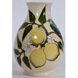 A Moorcroft vase decorated in the lemon