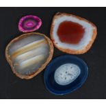 A collection of 4 slices of agate minera