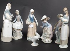 A collection of Lladro / Nao figurines t
